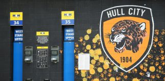 Hull City reveals Sportsbet.io as Turkish betting partner Hull City badge painted on wall of KCom stadium.