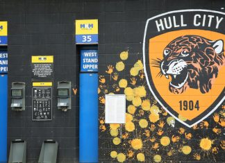 Hull City reveals ‘landmark’ sponsorship agreement Hull City badge painted on wall of KCom stadium.