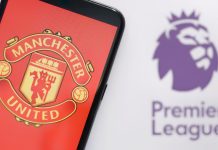Manchester United unveils Snapdragon as 2024/25 kit sponsor Manchester United on a mobile phone in front of Premier League logo.