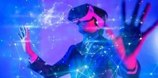 NBPA revolutionises fan experience with metaverse launch Man in VR headset touching a digital barrier.