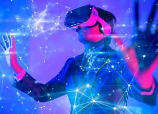 NBPA revolutionises fan experience with metaverse launch Man in VR headset touching a digital barrier.