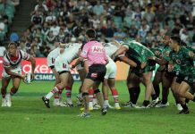 NRL remains one of Australia’s most viewed sports leagues Rugby player in the NRL passing the ball out after a scrum.