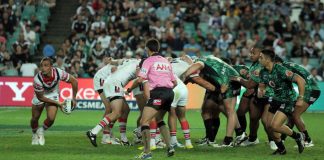 NRL remains one of Australia’s most viewed sports leagues Rugby player in the NRL passing the ball out after a scrum.
