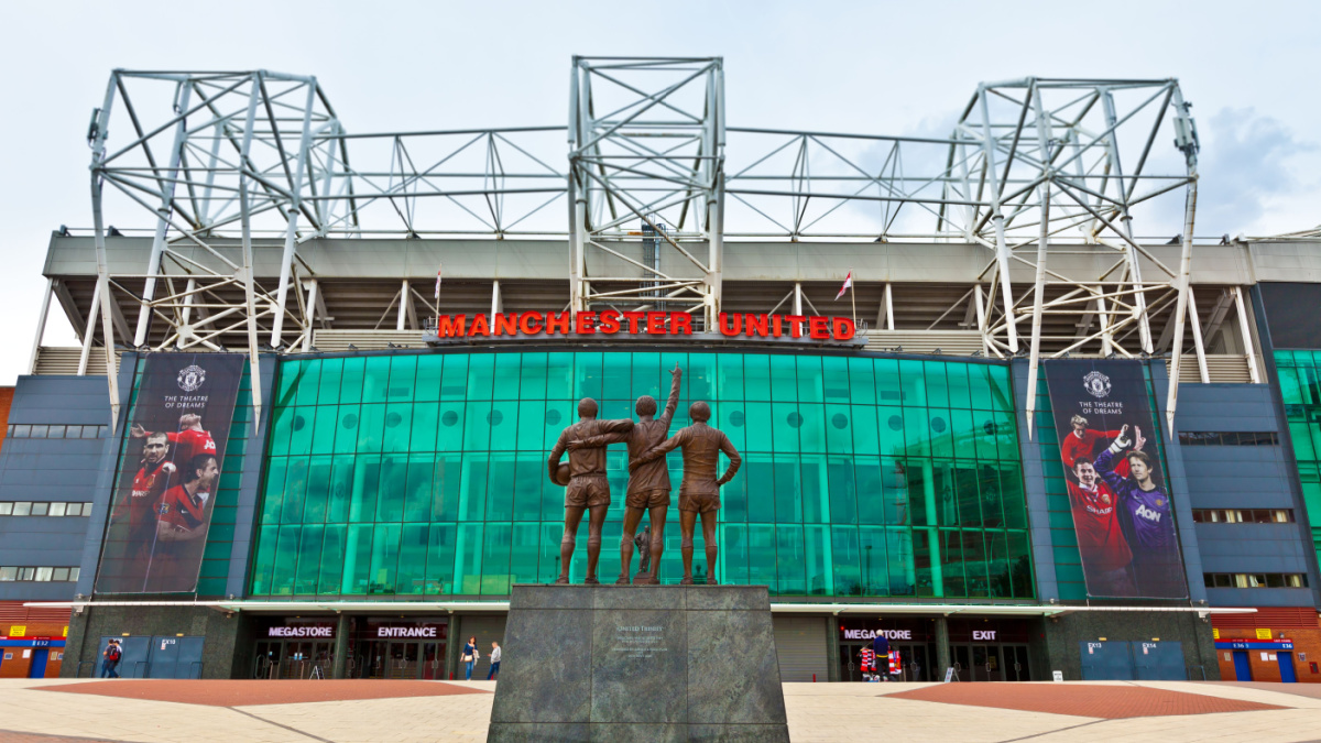 The trilogy statue in front of Old Trafford.