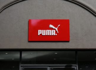 RB Leipzig ends long-lasting Nike ties with Puma deal A red Puma sign on the front of a shop.