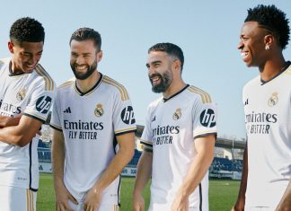 Real Madrid secures first-ever kit sleeve sponsorship Real Madrid first-team players posing in new sponsored kits.