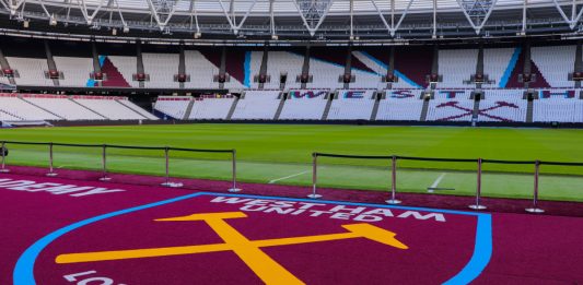 West Ham crest on floor in stadium.