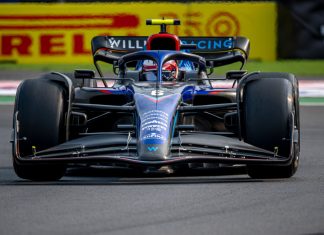 Williams Racing fires up an old partnership with Komatsu A Williams Racing F1 car on a track.