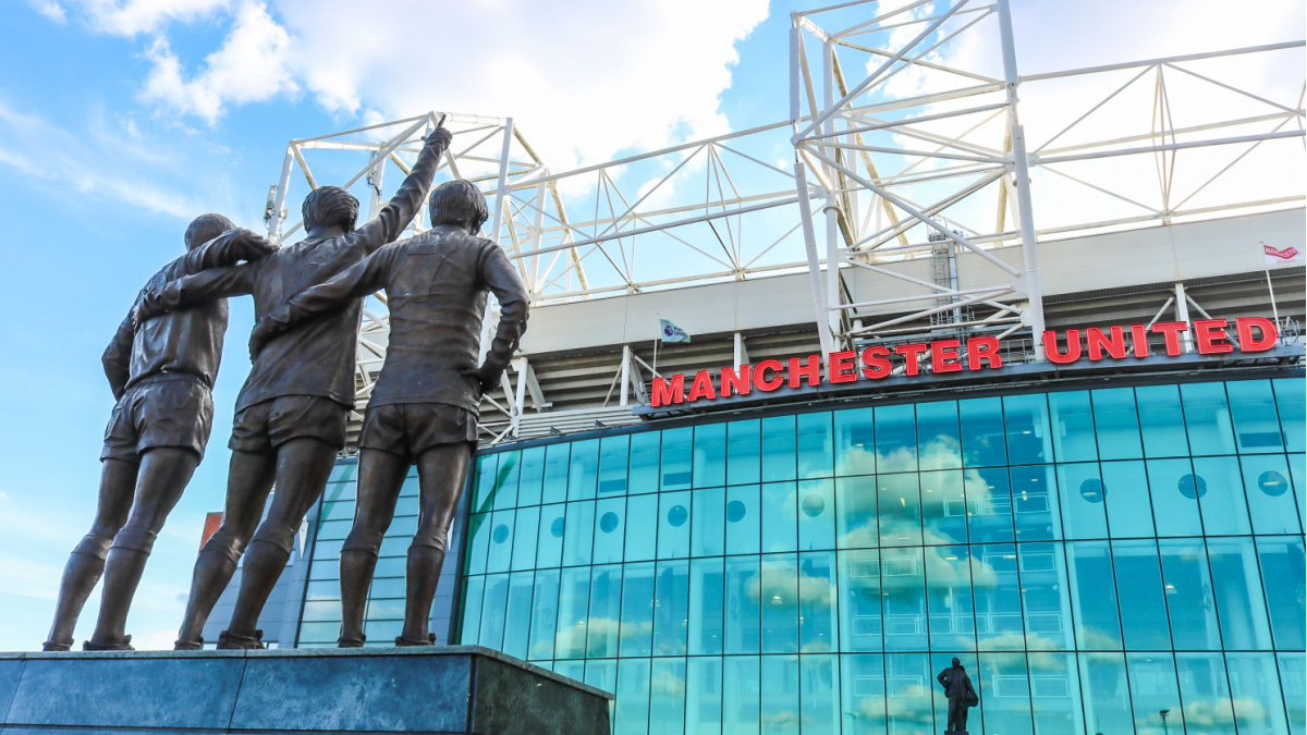 The trinity statue outside of Old Trafford.