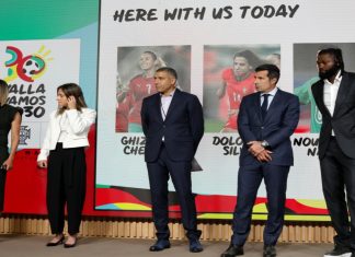 Morocco, Portugal and Spain unveil 2030 FIFA World Cup plans Nourredine Naybet, Luis Figo and Emmanuel Adebayor stood on stage.