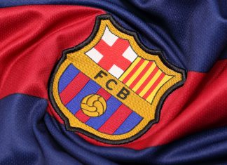 FC Barcelona to end Nike deal and explore its own brand The logo of Barcelona football club on an official jersey
