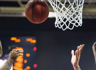 NBA and Sportradar create hyper-personalised viewing experiences Basketball ball, in the background information board.