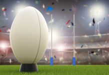 Pitch International secures rights for 2025 Lions Tour 3D rendering rugby ball with rugby posts on field.