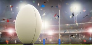 Pitch International secures rights for 2025 Lions Tour 3D rendering rugby ball with rugby posts on field.