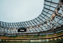 bwin champions volunteers with UEFA opportunity Aviva Stadium in Dublin with digital screen showcasing bwin Fan Final.