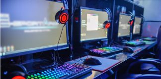 Rocket League Esports & Ally provide platform for women Gamer computer on line in internet cafe.