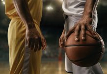 Roku & NBA launches ‘tailored to the fan’ streaming channel Two basketball players on big professional arena before the game.