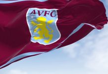 Aston Villa selects Adidas ahead of Champions League debut The flag of Aston Villa Football Club waving in the wind on a clear day.
