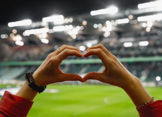 SkyBet and BHF ‘take action’ with footballers in CPR initiative Heart shape for the favorite football club during a match in a stadium.