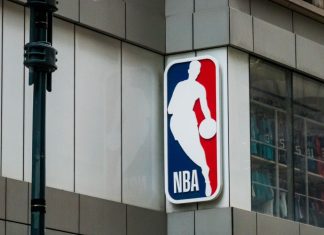 NBA team sponsorship revenue up 91% in five years A sign for the NBA Store in Manhanttan.