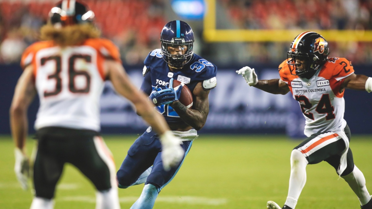 Toronto Argonauts Running back James Wilder Jr (32) running for a touch down during the BC lions at Toronto Argonauts game at BMO Field in Toronto, ON.