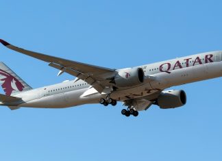 Qatar Airways renews deal to take UEFA to new heights Airbus A350 of Qatar airways arriving from Doha under a bright sunlight. photo taken at Islamabad-Pakistan.