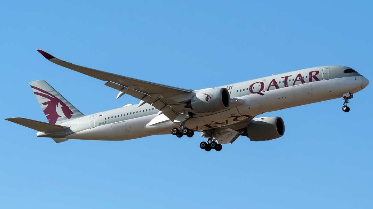 Airbus A350 of Qatar airways arriving from Doha under a bright sunlight. photo taken at Islamabad-Pakistan.