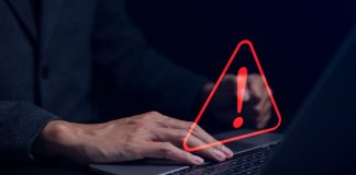 IBIA: Esports contributes to half of 90 betting alerts for Q2 Businessman working on the computer. Warning alert system concept, hacked on the computer network, crime and virus, Malicious software, compromised information, illegal connection, data vulnerability.