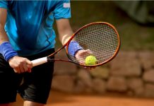 Nick Iliffe, ITIA: Why collaboration is key to upholding tennis’ integrity A tennis player prepares to serve a tennis ball during a match.