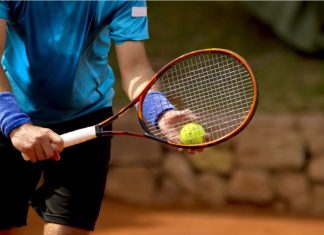 Nick Iliffe, ITIA: Why collaboration is key to upholding tennis’ integrity A tennis player prepares to serve a tennis ball during a match.