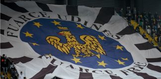Udinese ‘keeps up with the times’ with meme coin sponsorship Udinese's flag over fans on the grandstand during Italian football Serie A match Udinese Calcio vs SSC Napoli.