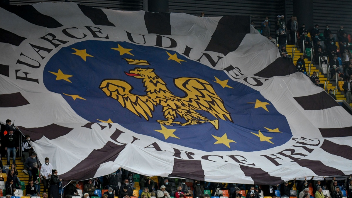 Udinese's flag over fans on the grandstand during Italian football Serie A match Udinese Calcio vs SSC Napoli.