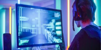 Navi joins forces with Visa to create CS2 esports pathway Shot of the Professional Gamer Playing in First-Person Shooter Online Video Game on His Personal Computer. Room Lit by Neon Lights in Retro Arcade Style. Online Cyber e-Sport Internet Championship.