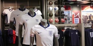 Fanatics and FA renew partnership after Euro 2024 success England football kits in a store.
