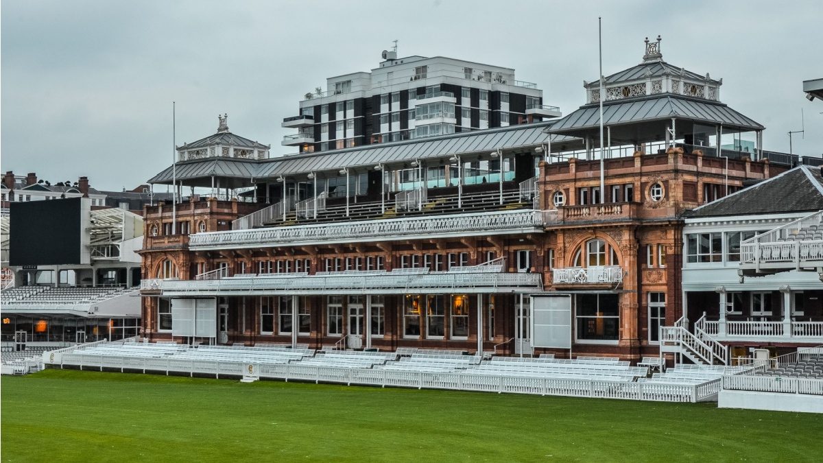 The grand Old Pavilion in The Lord's Cricket Ground on an overcast day.