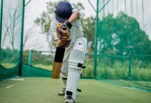 ECB continues on digital transformation path with Cognizant Front view of Cricket Batsman Action, Cricket game closeup player batting ball.