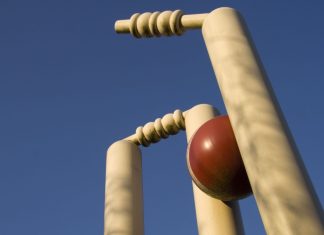 Inside Old Glossop CC: The fight for cricket funding Cricket ball hitting wickets.