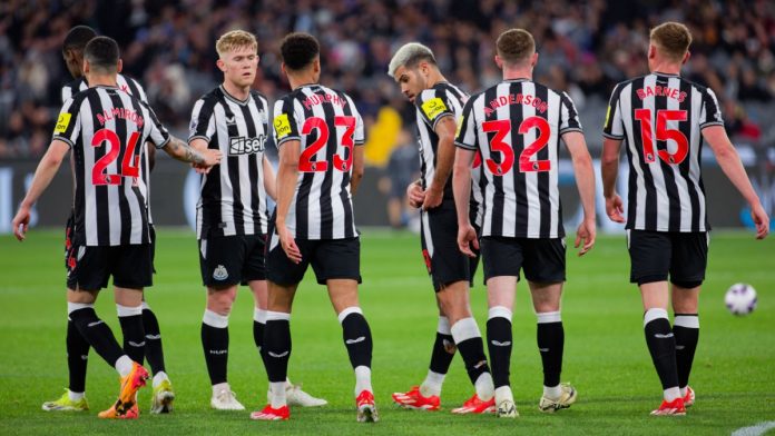 Newcastle United players celebrate after scoring a goal during the Exhibition match between Tottenham and Newcastle United at the MCG on May 22, 2024 in Melbourne, Australia.