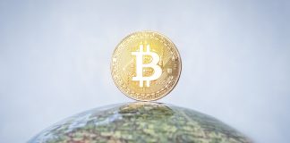 DAZN enters crypto sphere with European partnership BITCOIN tag on the globe. gold bitcoin with gold bitcoin symbol and Earth.