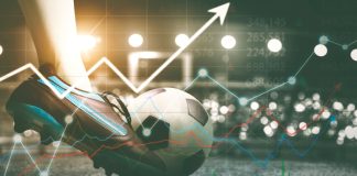 Calls for action grow as Premier League gambling ads triple Double exposure of soccer player feet kicking a ball in the stadium with upward arrow background.