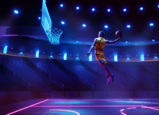 SLB takes inaugural cup final to Motorpoint Arena Nottingham Scoring winning goal. Young man, professional basketball player in yellow uniform jumping, throwing ball into basket on 3D stadium with flashlights. Concept of sport, competition, action and motion.