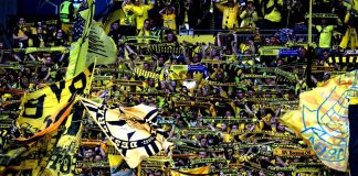 Borussia Dortmund unlocks AI-powered content in new deal London, ENGLAND - June 1, 2024: Borussia Dortmund fans support their team ahead of the UEFA Champions League Final Borussia Dortmund v Real Madrid CF at Wembley Stadium.