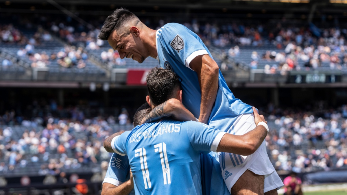 New York, NY - July 9, 2022: Valentin Castellanos (11) of NYCFC celebrates with teammates scoring goal during MLS regular season game against New England Revolution at Yankee stadium.