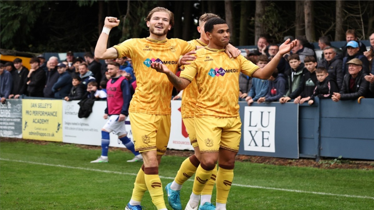 Sutton United players celebrating win in the previous round vs Chertsey.