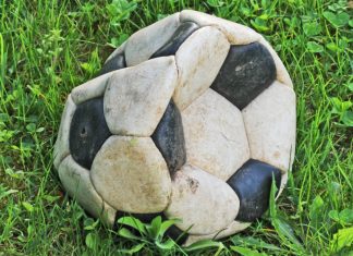 CJEU ruling sparks potential collapse of FIFA transfer system Old, deflated football.