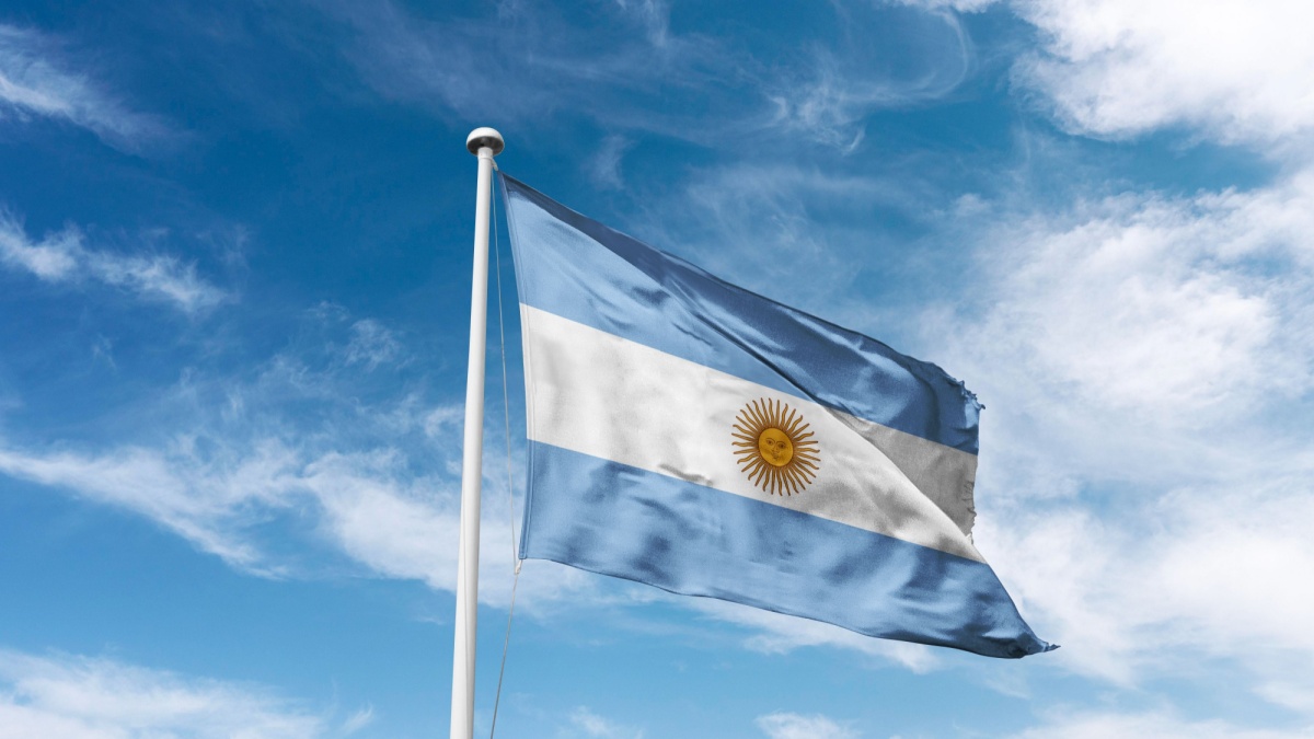 Argentina flag waving at cloudy sky background. the Argentine Republic flag.