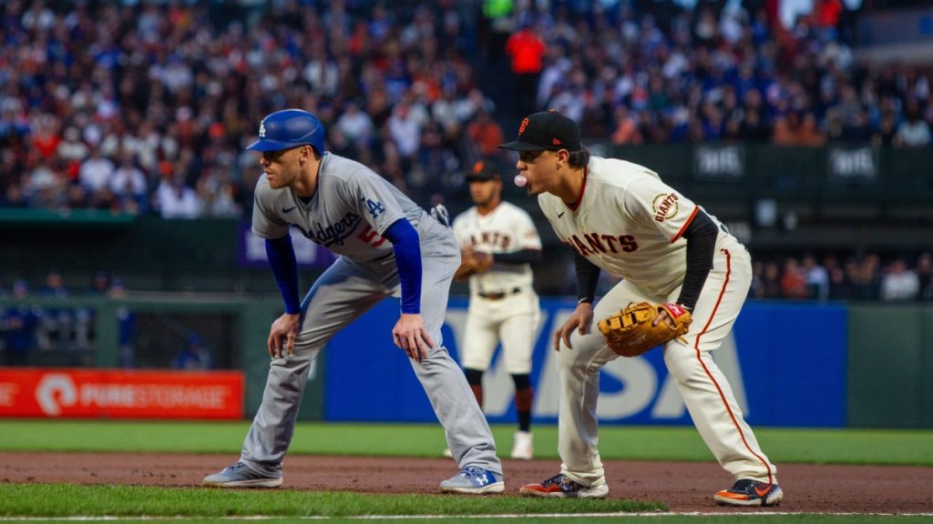 April 10, 2023 - San Francisco: Los Angeles Dodgers first baseman Freddie Freeman takes his lead next to San Francisco Giants first baseman Wilmer Flores at Oracle Park.