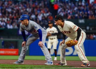 MLB embraces data scouting with Sportradar partnership April 10, 2023 - San Francisco: Los Angeles Dodgers first baseman Freddie Freeman takes his lead next to San Francisco Giants first baseman Wilmer Flores at Oracle Park.