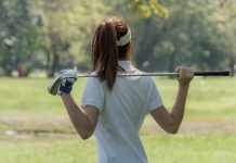KPMG applauds women’s golf resurgence with sponsorship renewal Women's golf Using golf clubs To help twist To warm up body before the play game with blurred soft nature background.