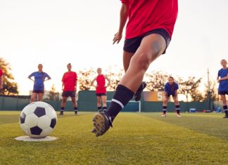 Driving change for women’s football: Bloomsbury’s ambitious goals Close Up Of Player Taking Penalty During Womens Soccer Match.